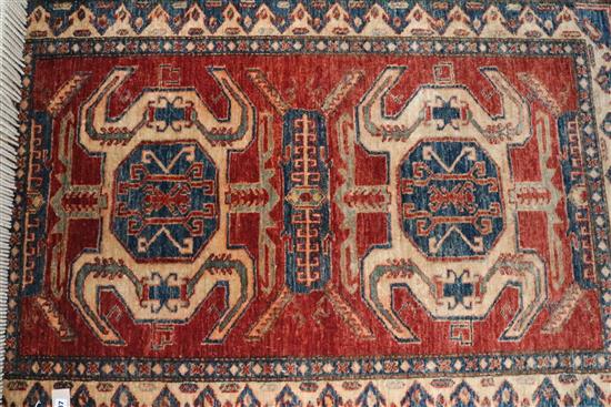 Caucasian small red ground rug